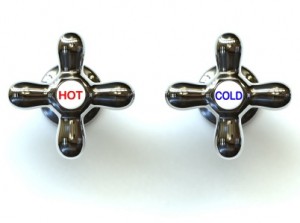 Hot and Cold Twin wall faucets. Hot and Cold. The labels did not indicate that turning on the Hot faucet would cause the gas-powered water heater to go "booooom".